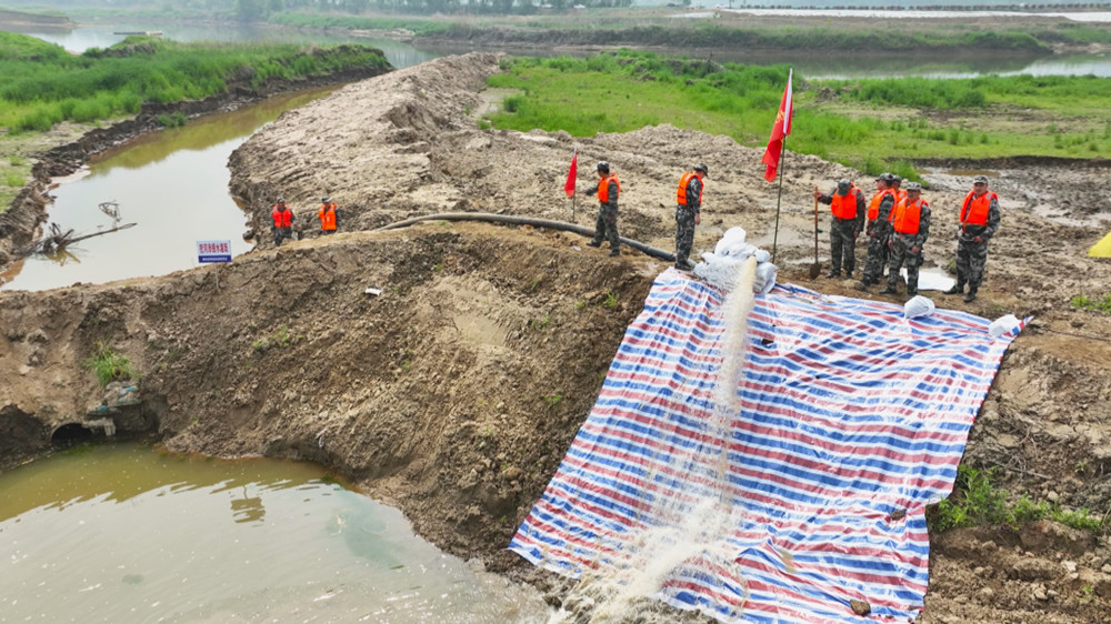圖為演練科目挖河滲提水灌溉現場.jpg