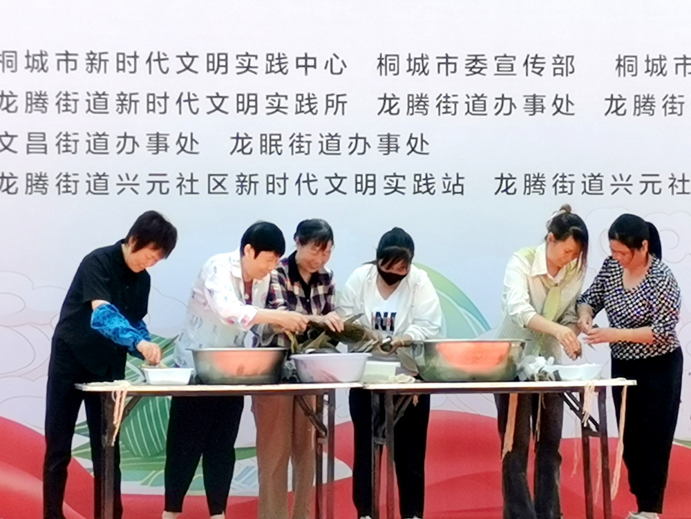 興元社區端午  包粽子比賽.jpg